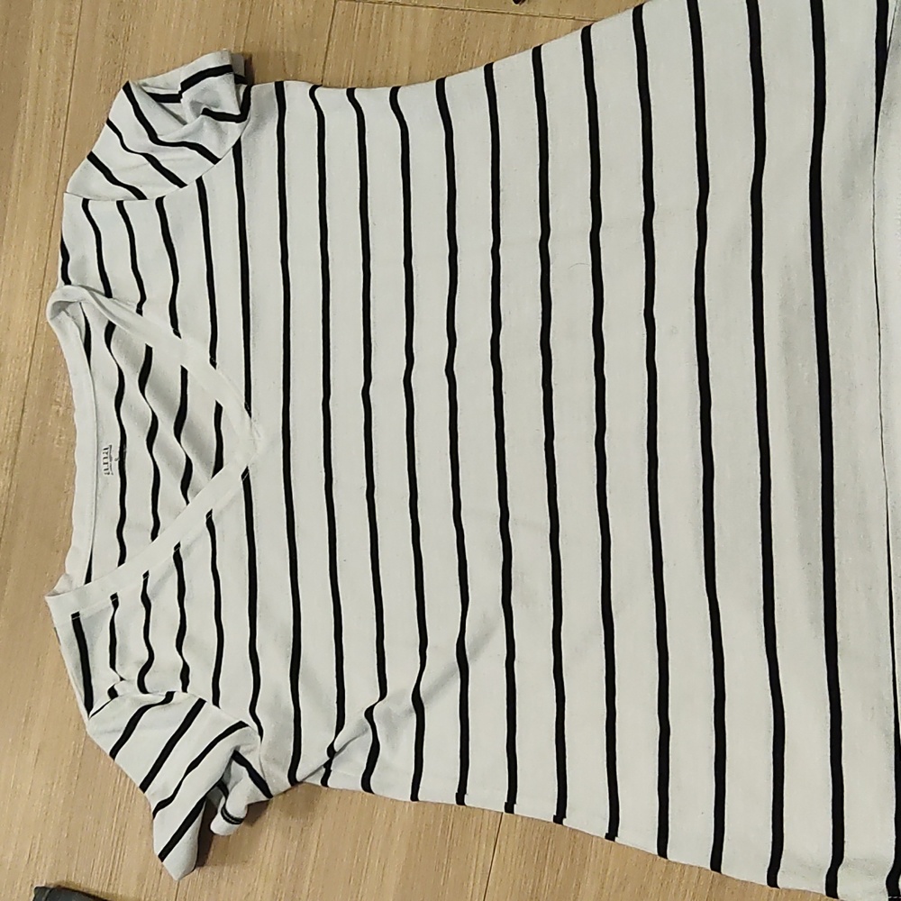 Black and white striped tshirt. Misses small. Perfect for a casual day out.